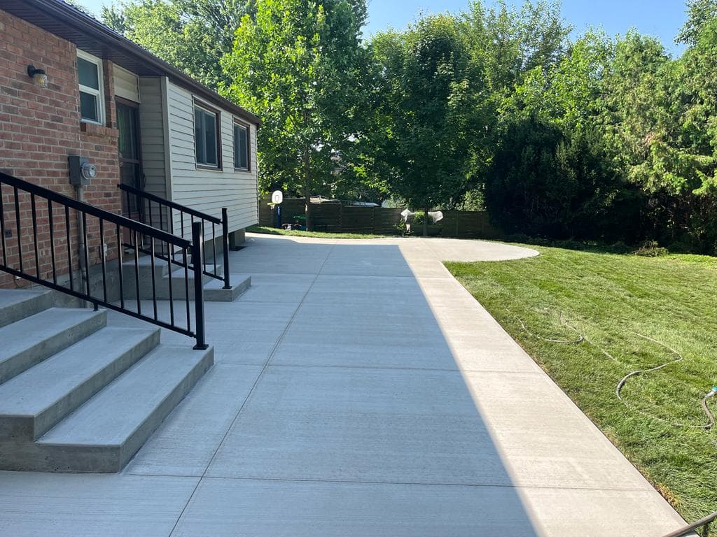 Smooth hand-trowelled concrete garage slab in London, Ontario